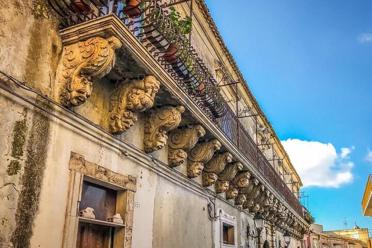 a building with statues on the side of it