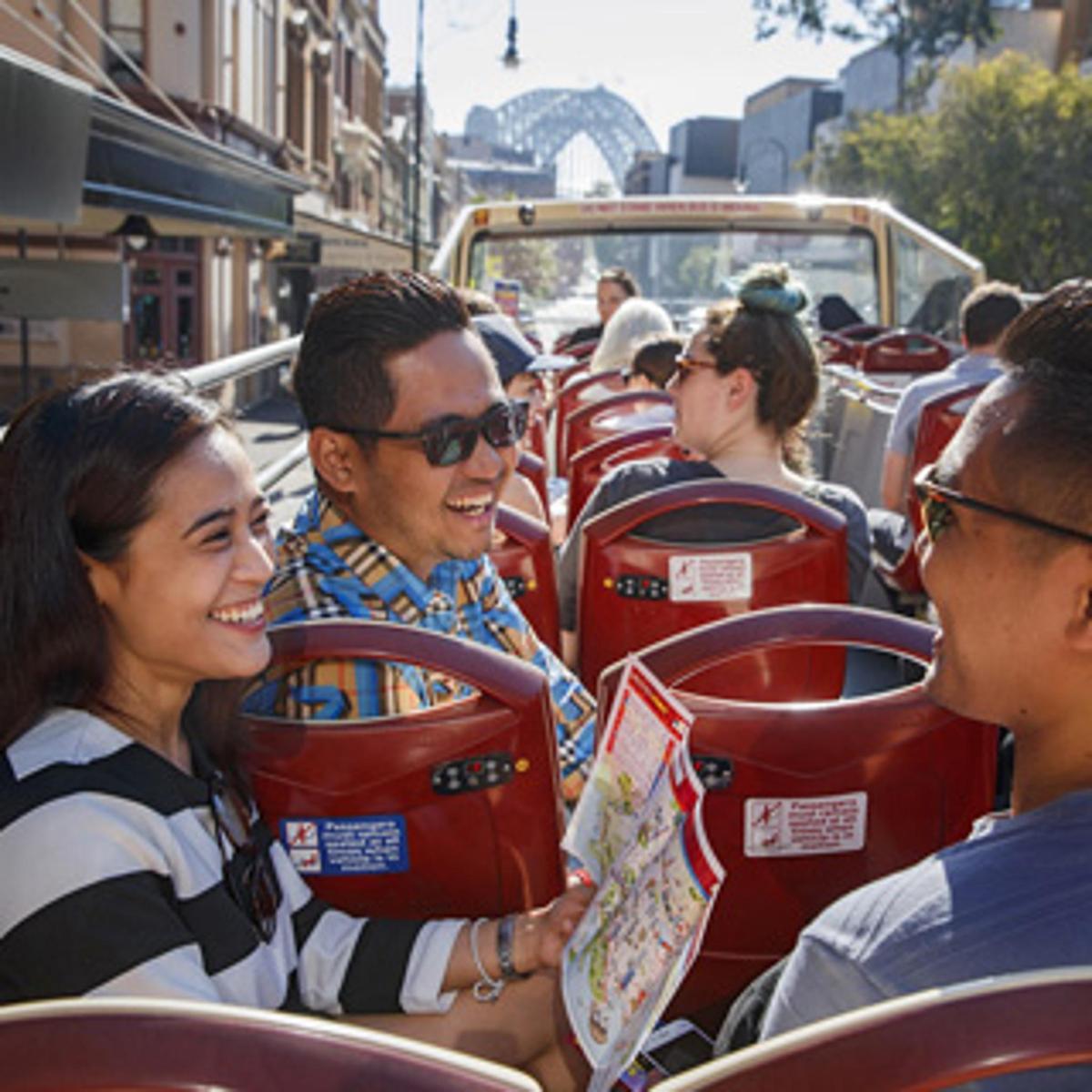 a group of people sitting on a bus