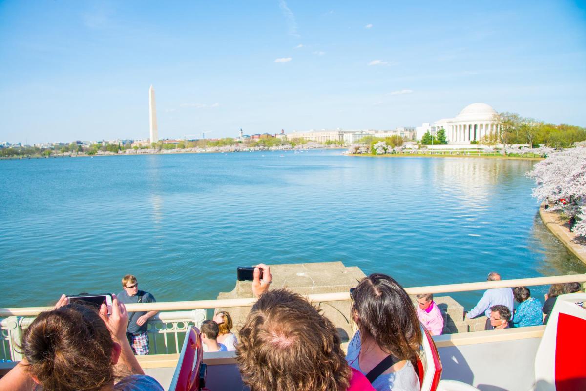 a group of people on a boat on the water