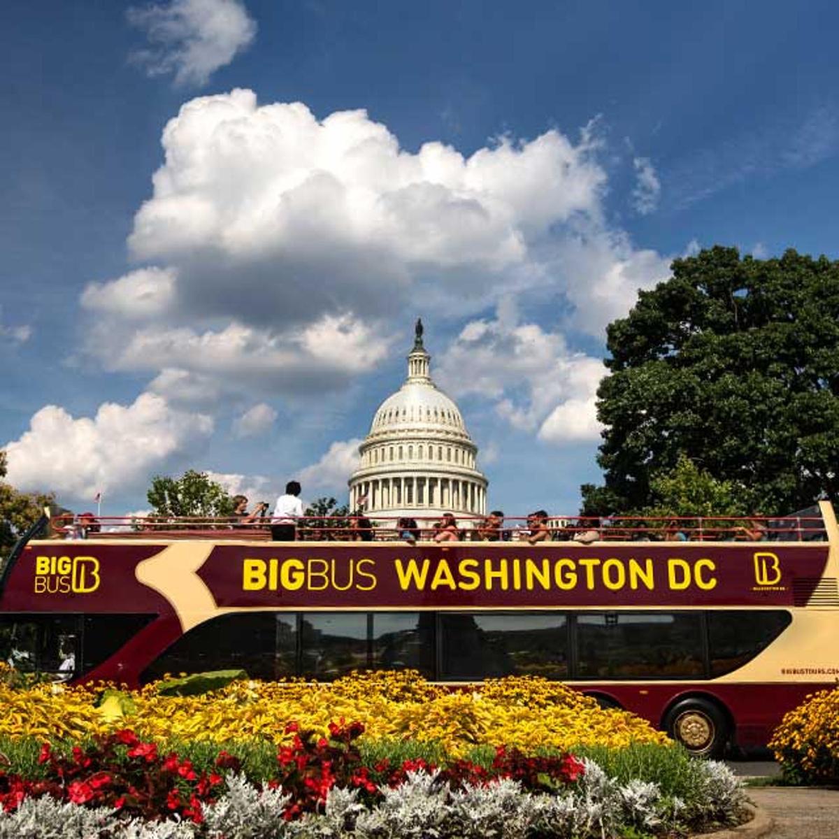 a double decker bus in front of the capitol building