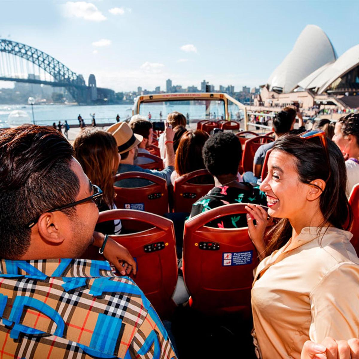 a group of people sitting on a boat in the water