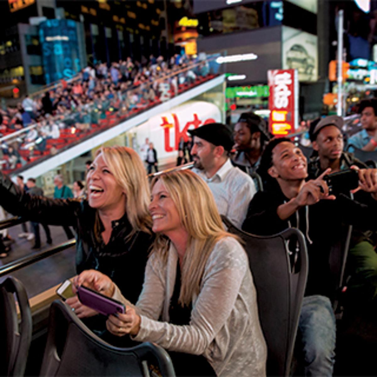 a group of people watching a baseball game