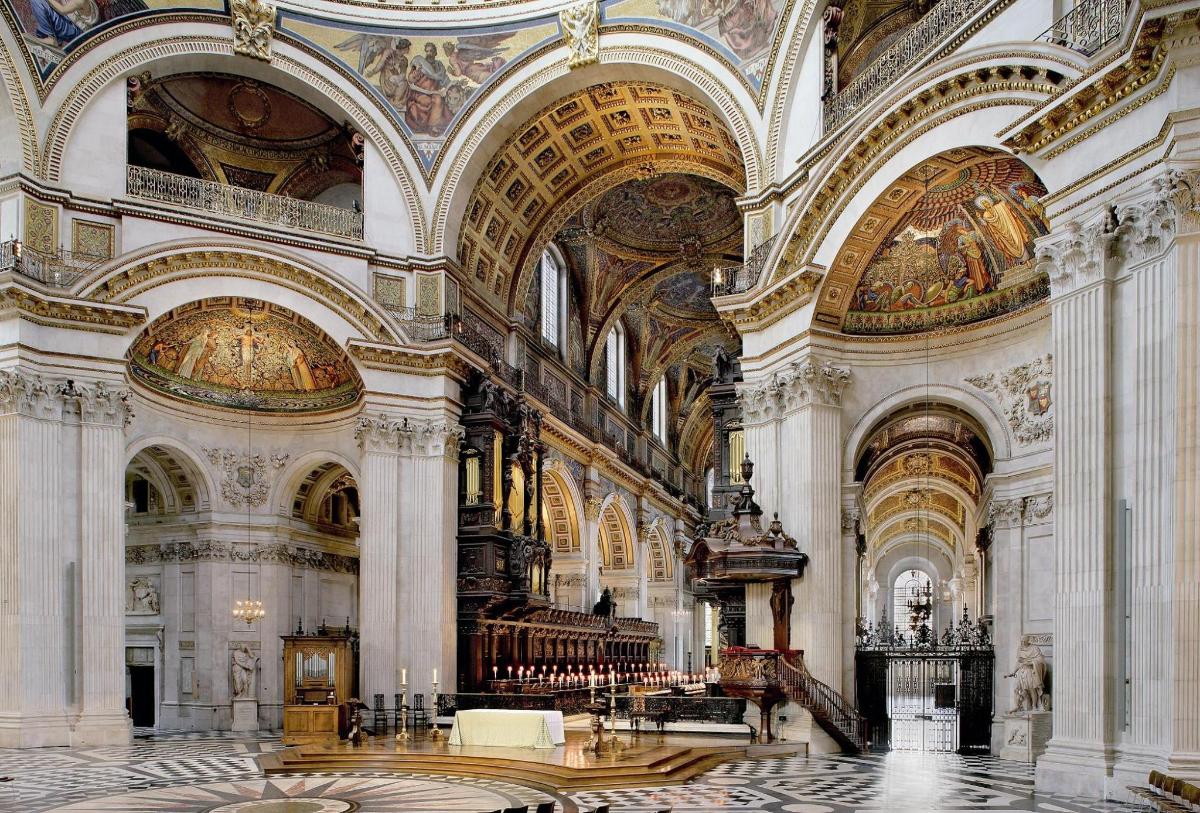 a large room with a large building with a cathedral