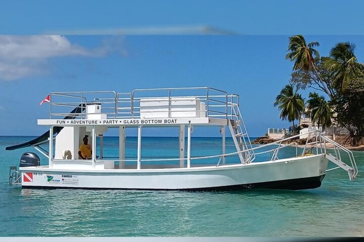 a white boat on the water in the ocean