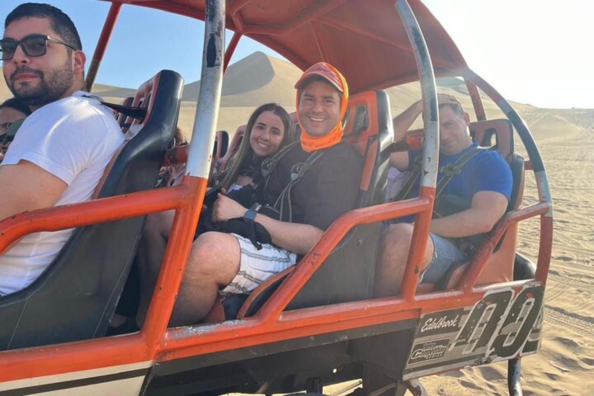 a group of people sitting in a ride in the desert
