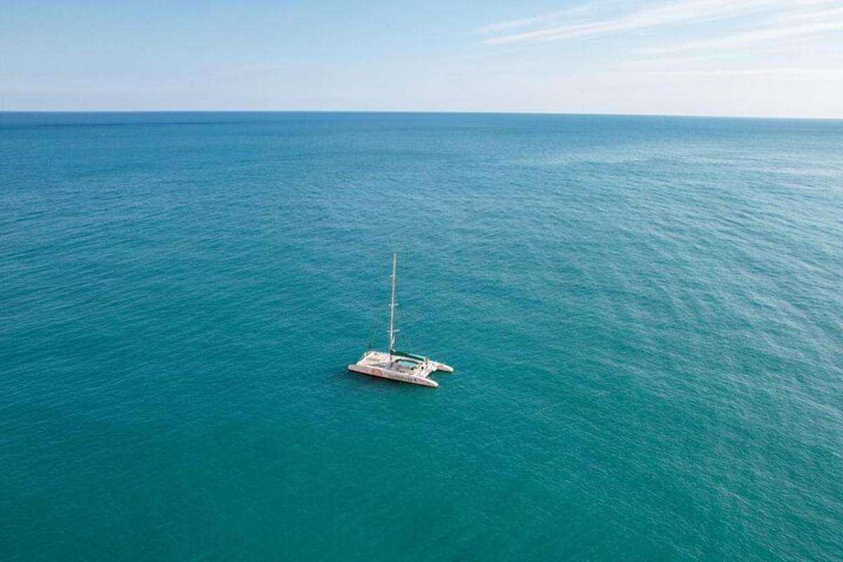 a boat in the middle of a large body of water
