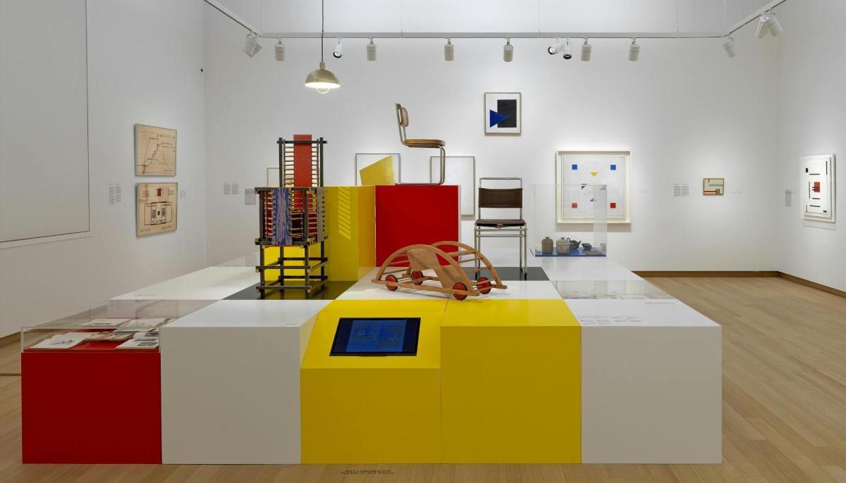 a exhibit in a white room with colorful legos