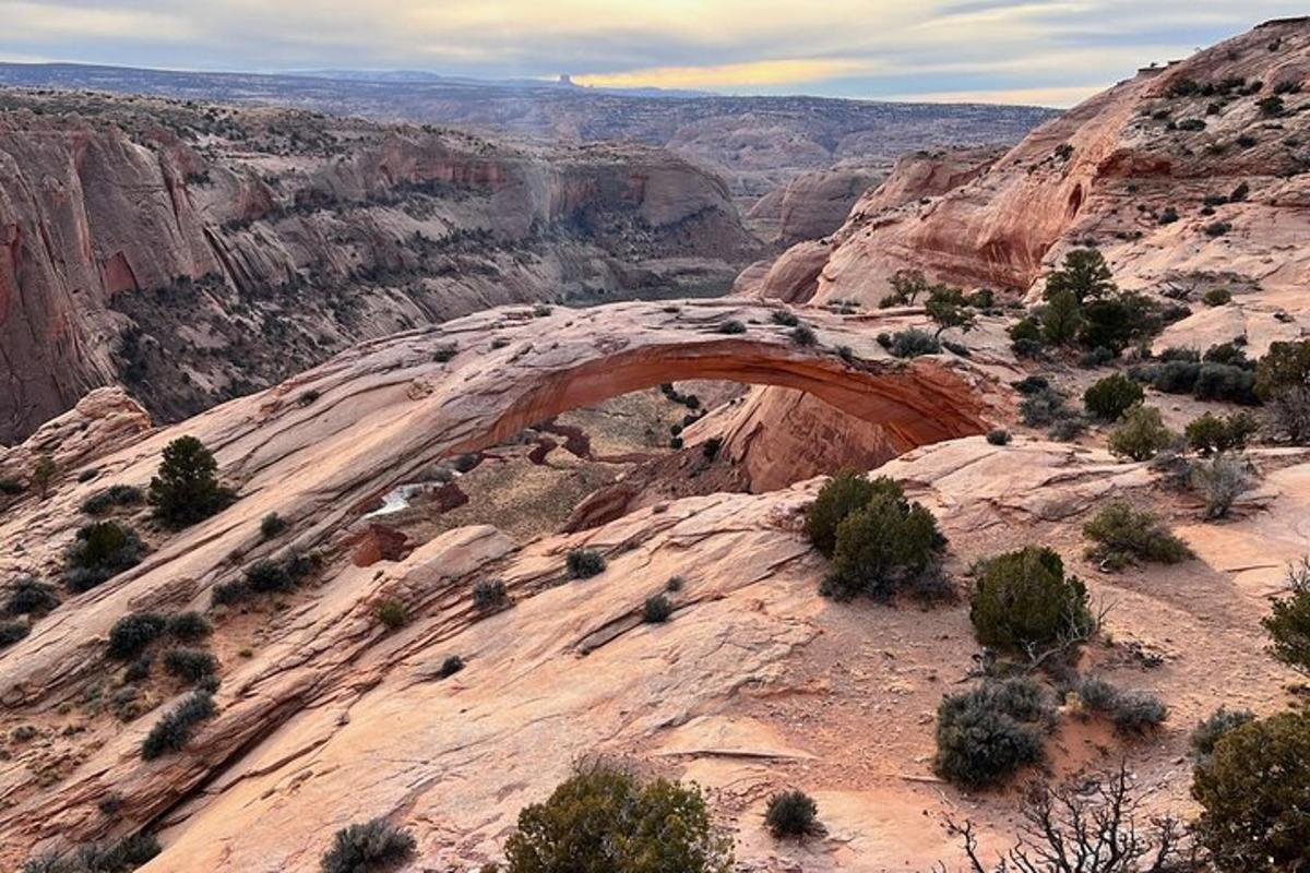 a view of an arch in a canyon