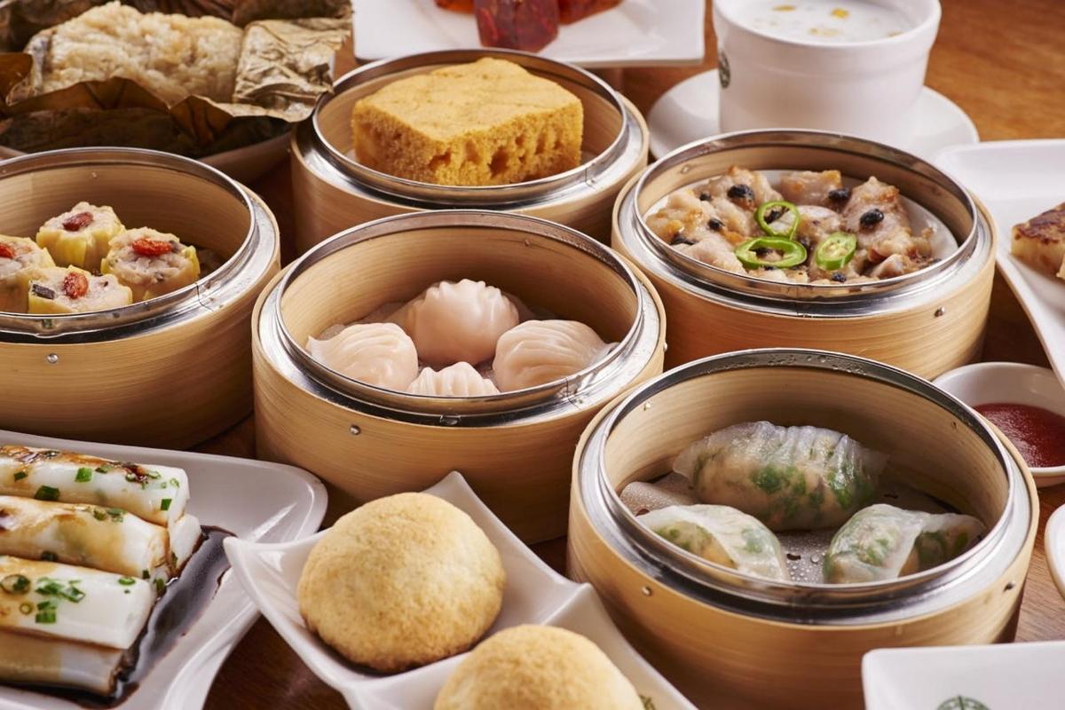 a bunch of different types of food in canisters