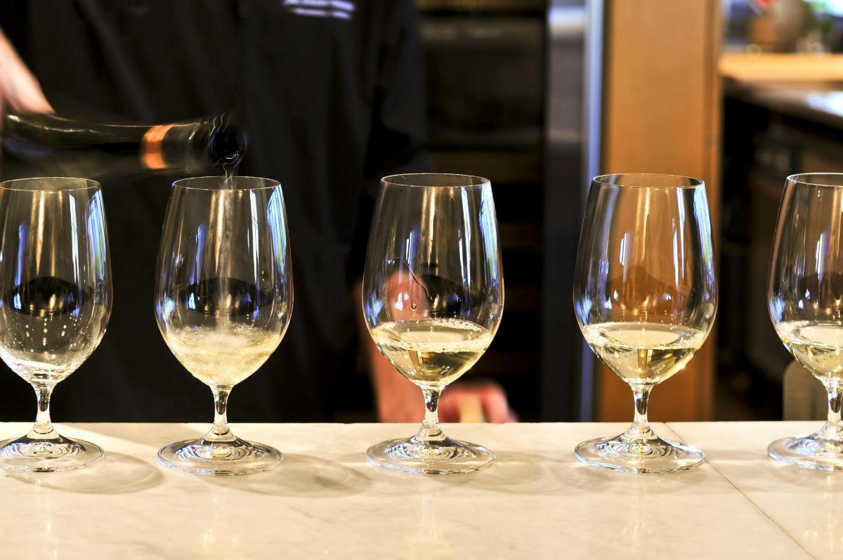 a group of wine glasses sitting on a table