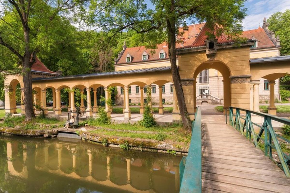 a building with a bridge next to a river
