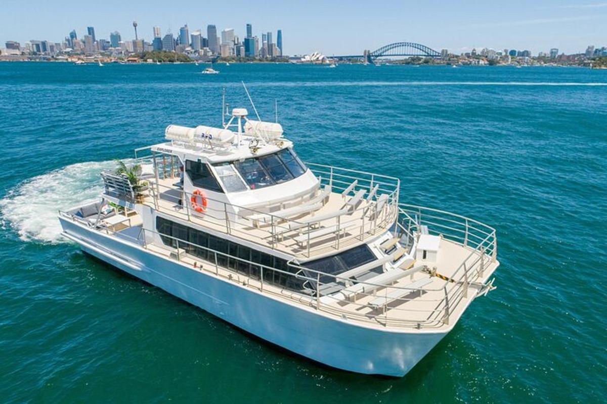 a boat in the water with a city in the background