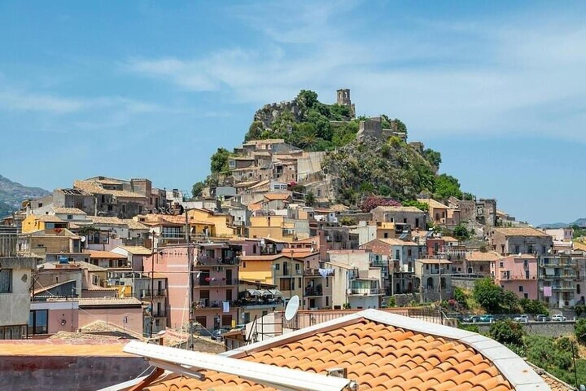 a town on top of a hill with houses