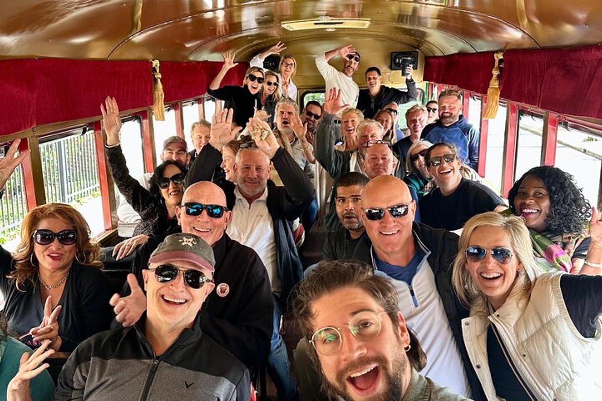 a group of people posing for a picture on a bus