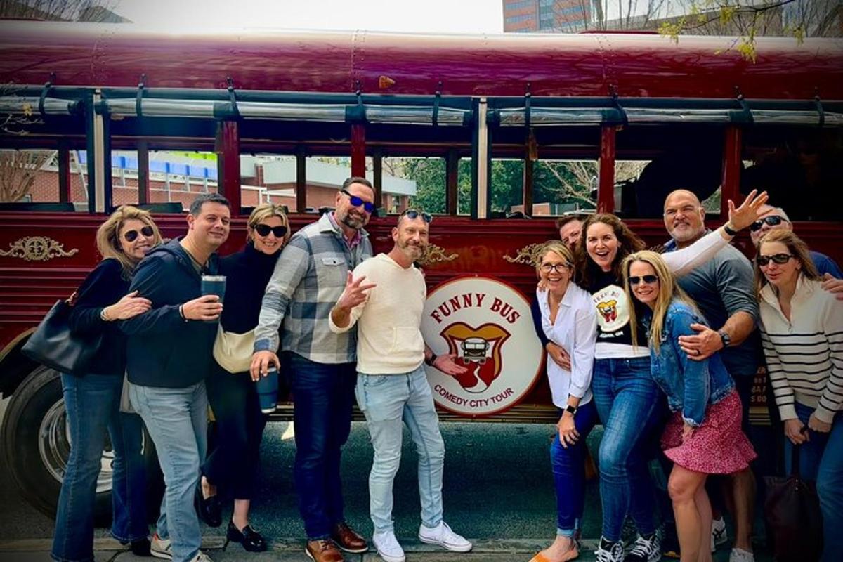 a group of people standing in front of a bus