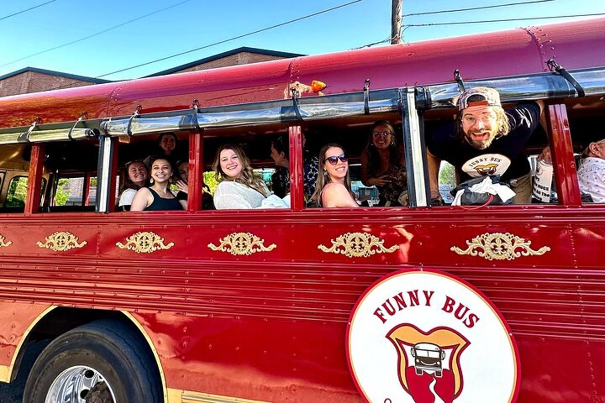 a group of people sitting in a red bus