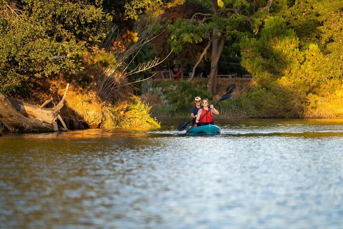 a man and a woman on a raft in the water