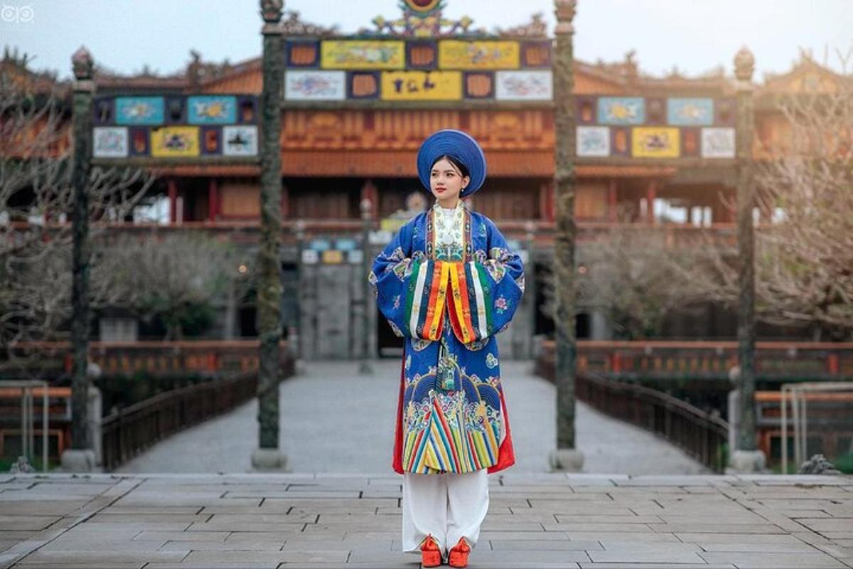 a woman is standing in front of a building