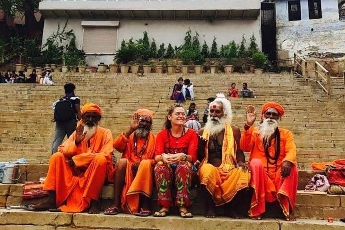 a group of people sitting on the steps