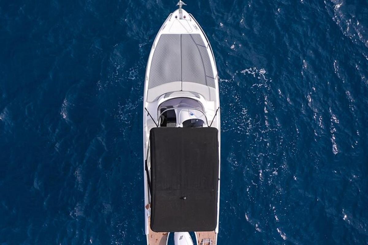 an aerial view of a boat in the water