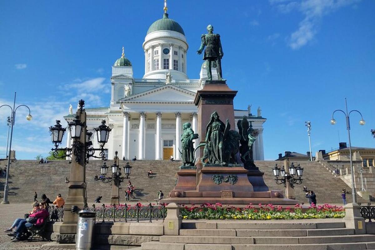 a statue in front of a building with a statue