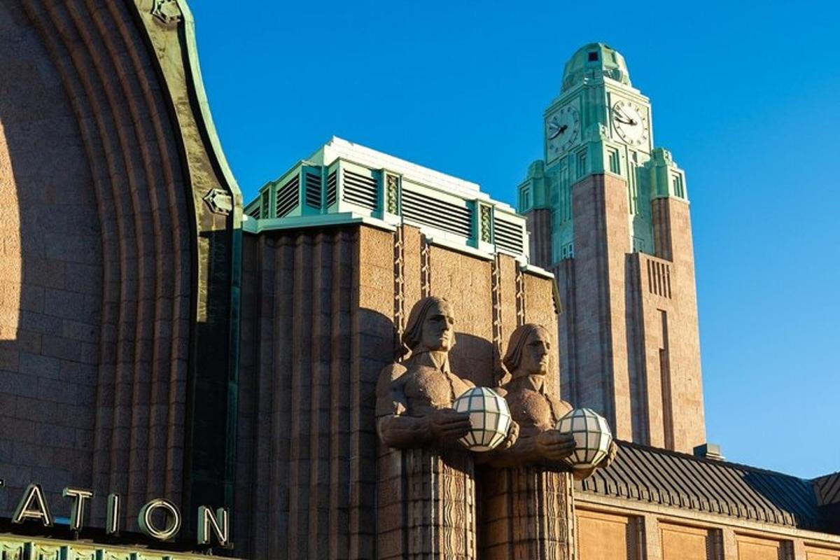 a building with two statues of women holding basketball balls