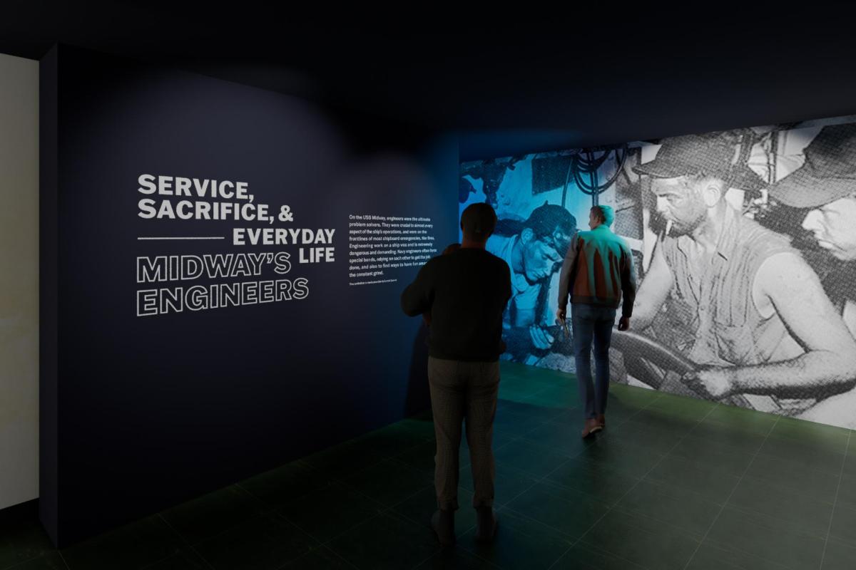 two people looking at a display in a museum