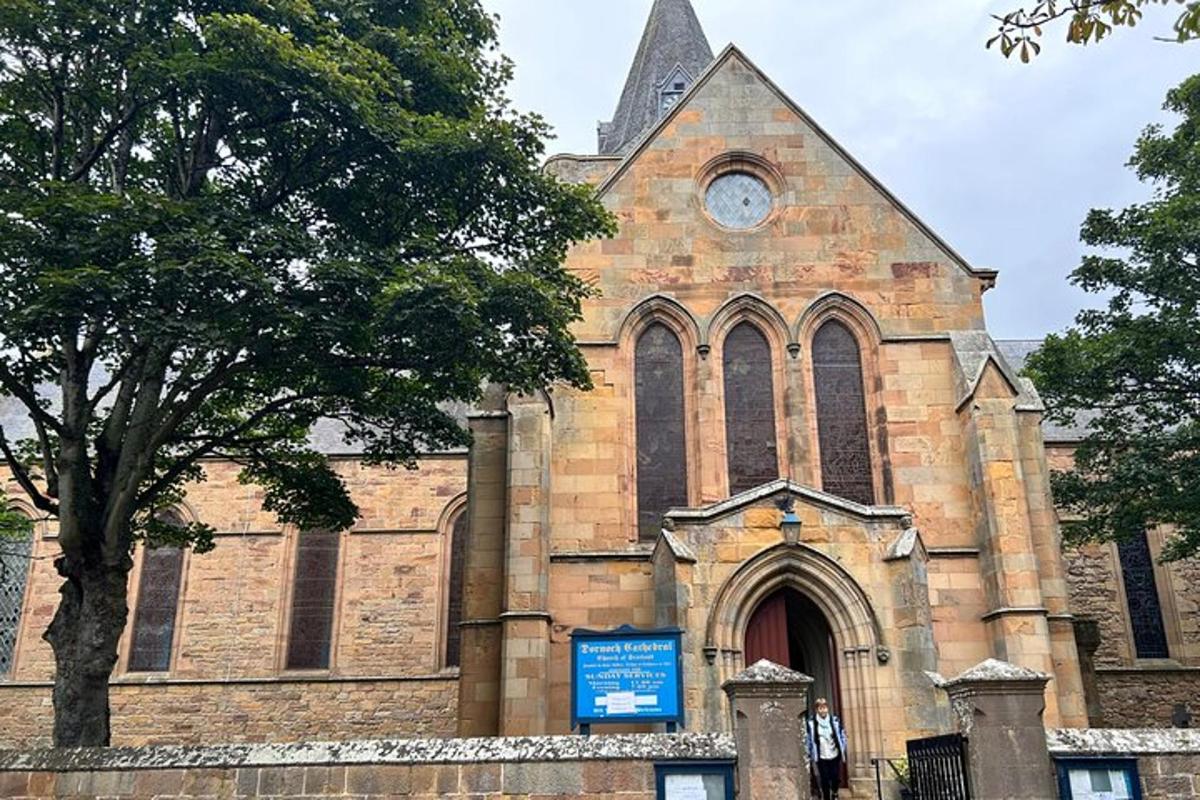 a church with a clock on the front of it