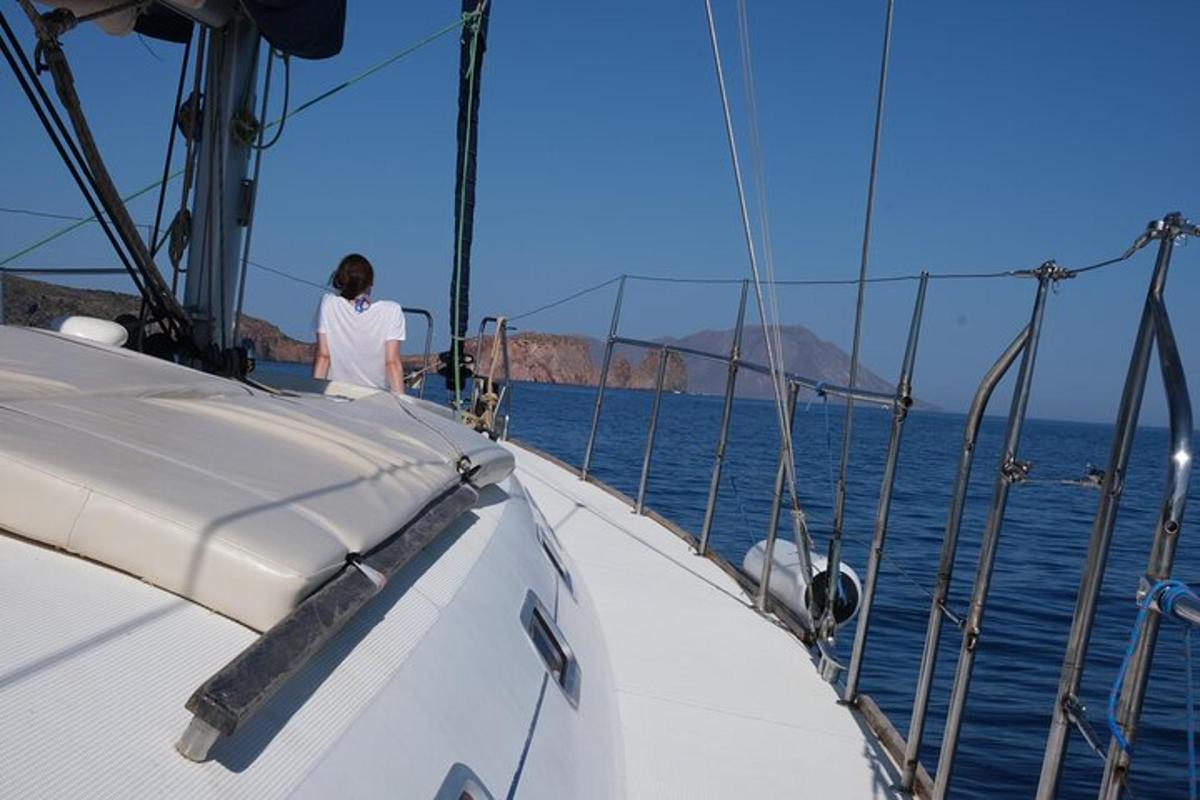 a person sitting on a boat in the water