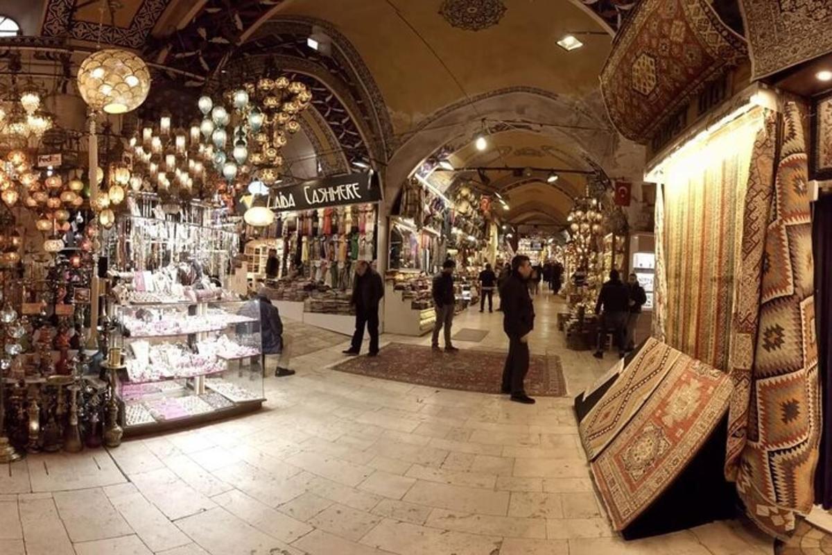 a market with people walking around in a building