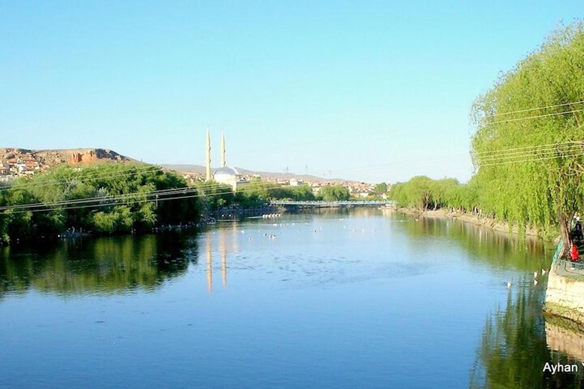a view of a river with a bridge over it