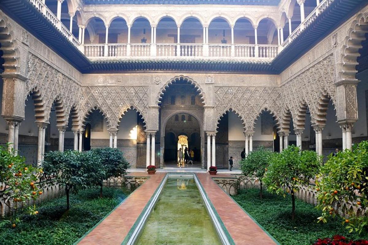 a courtyard with a fountain in a building