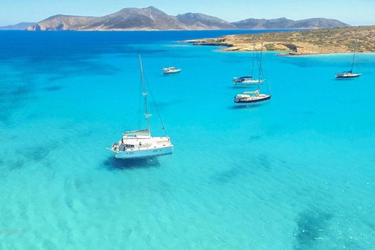 a group of boats in a large body of water