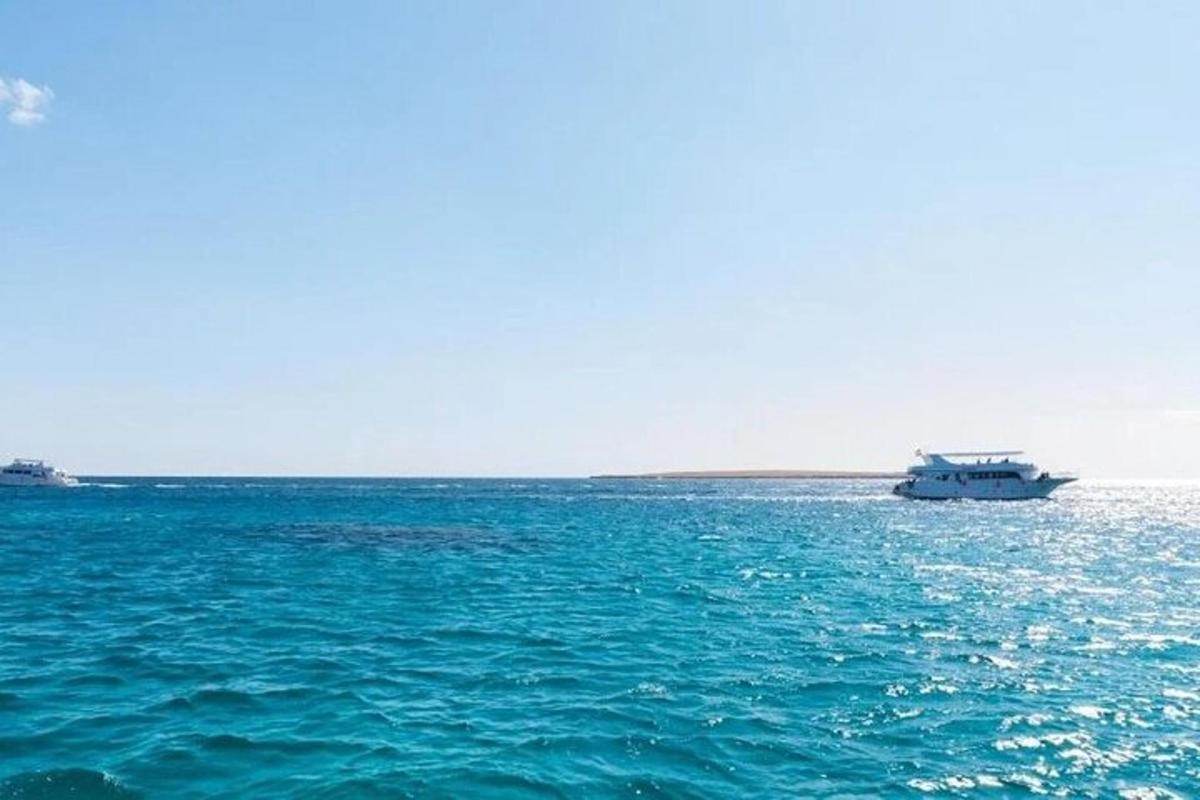 a boat in the middle of a large body of water