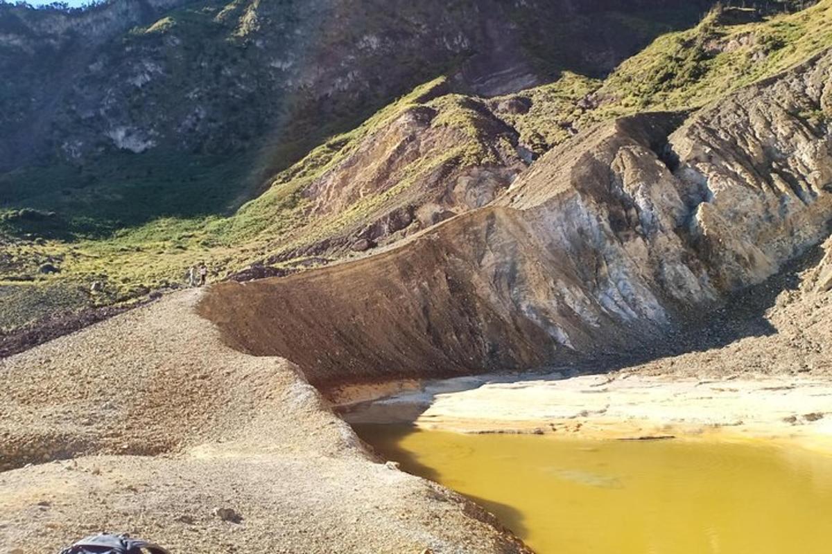 a view of a mountain with a body of water