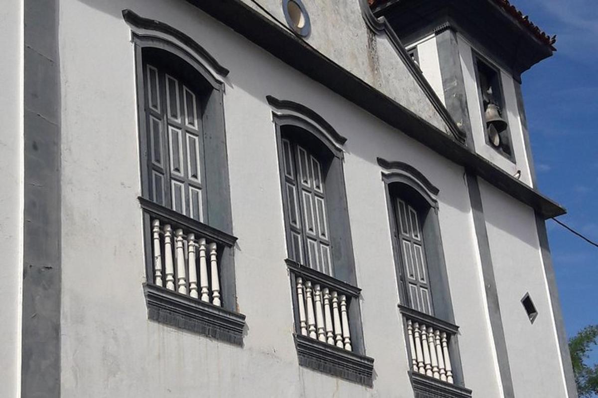 a white building with black windows on it