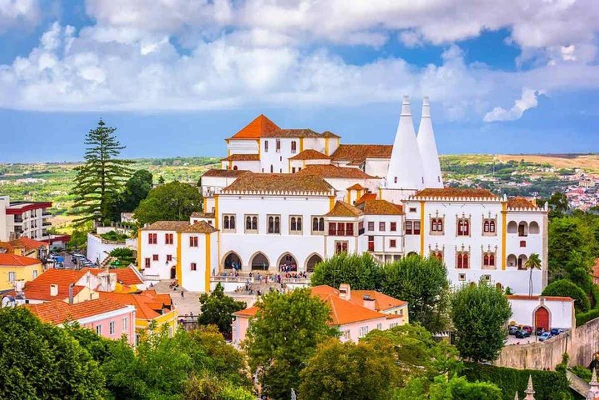 a city with a large building on a hill