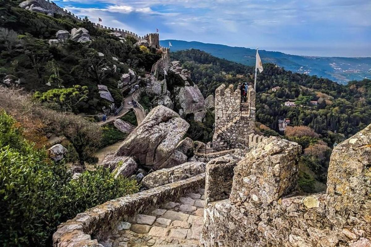 a castle on top of a rocky mountain