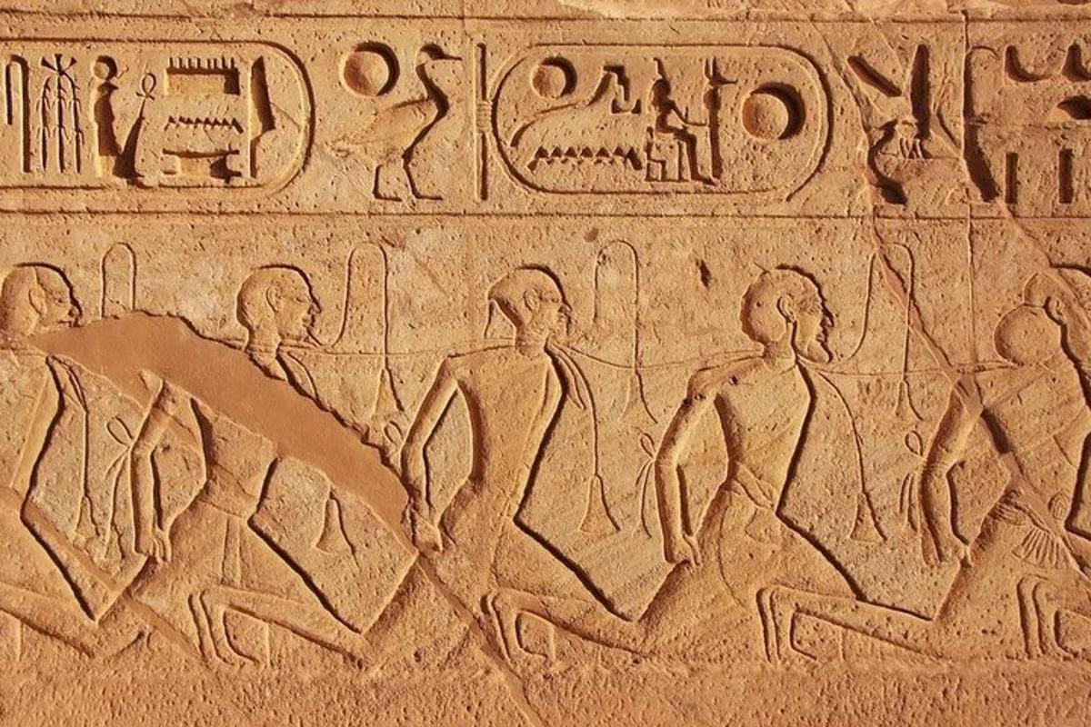 a relief of a group of people on a sarcophagus