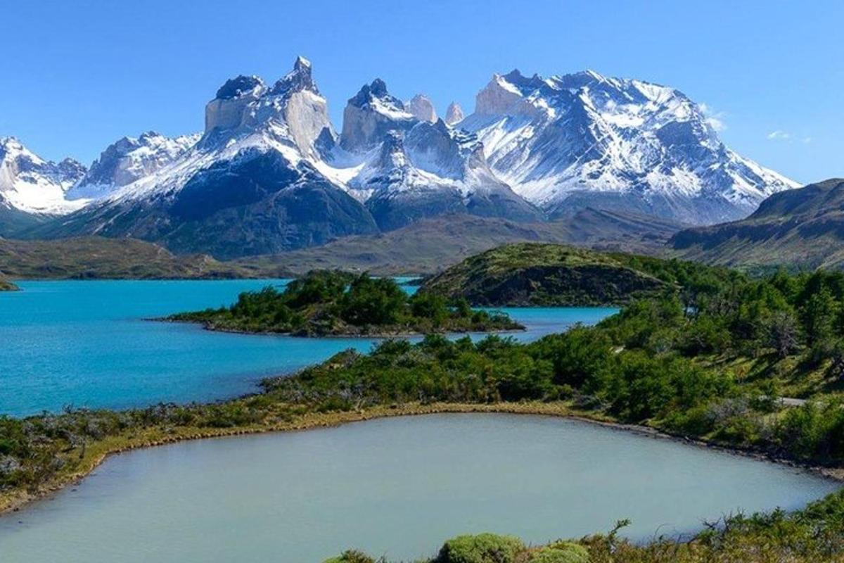 a mountain range with a lake in front of it