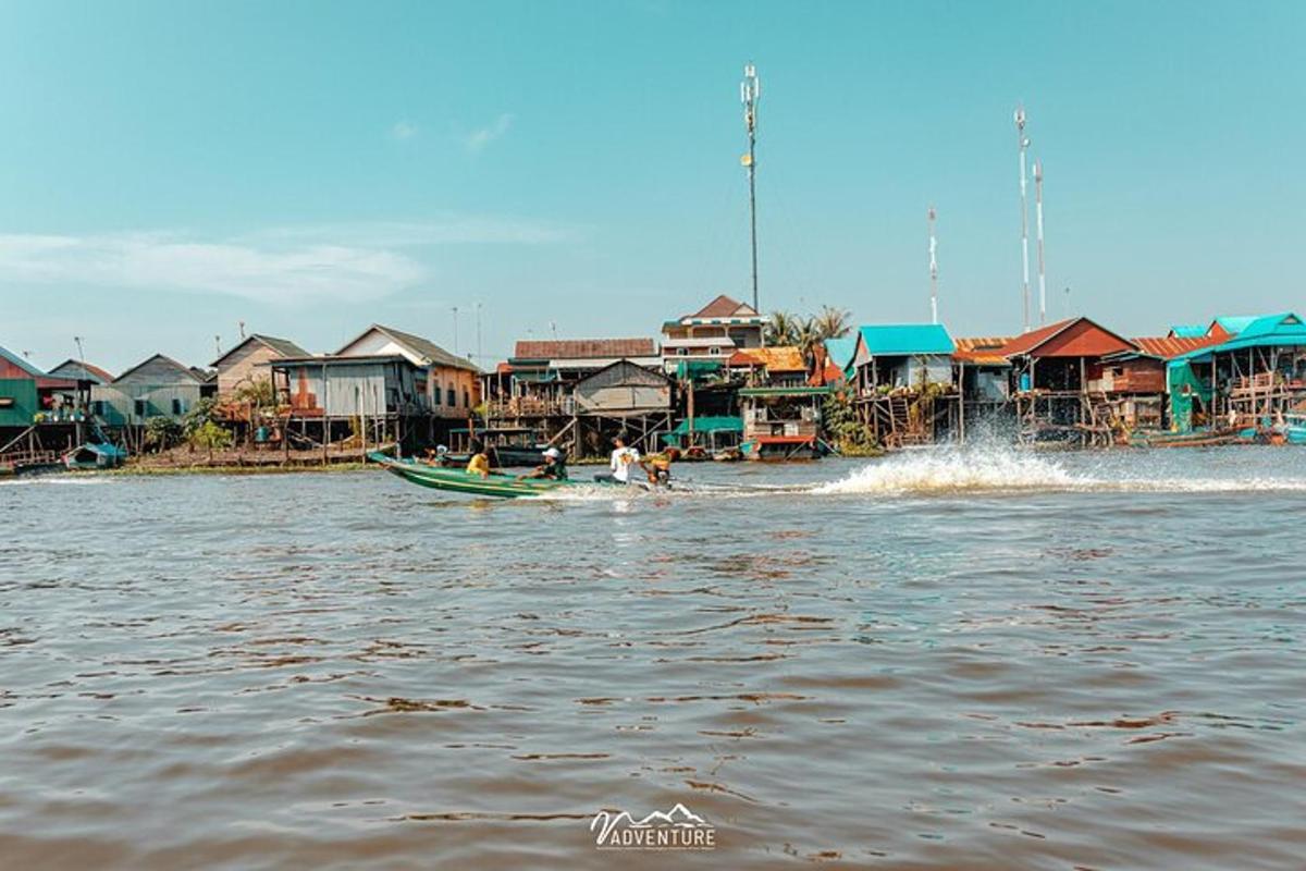 a group of people on a boat in the water