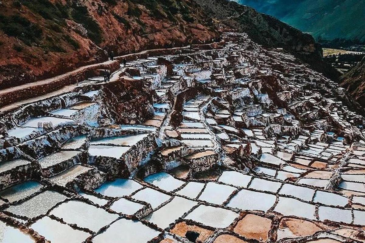 an aerial view of a village on a mountain