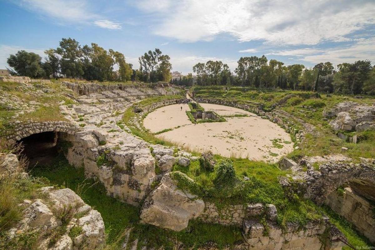 an aerial view of an amphitheater in a field