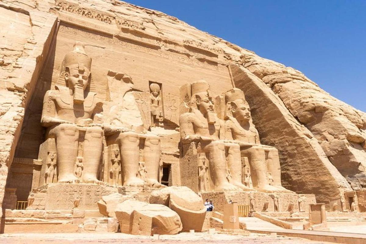 a large building with statues on the side of it
