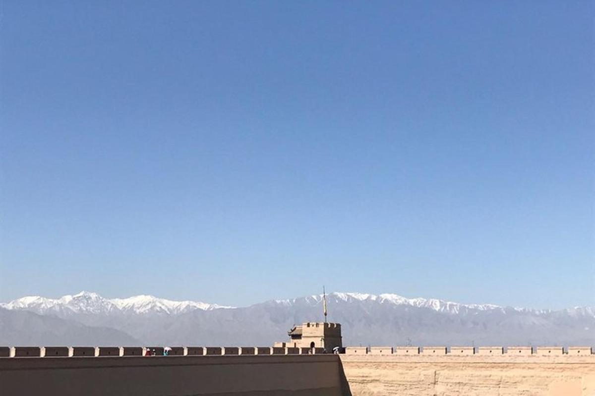 a view of the snow covered mountains in the distance