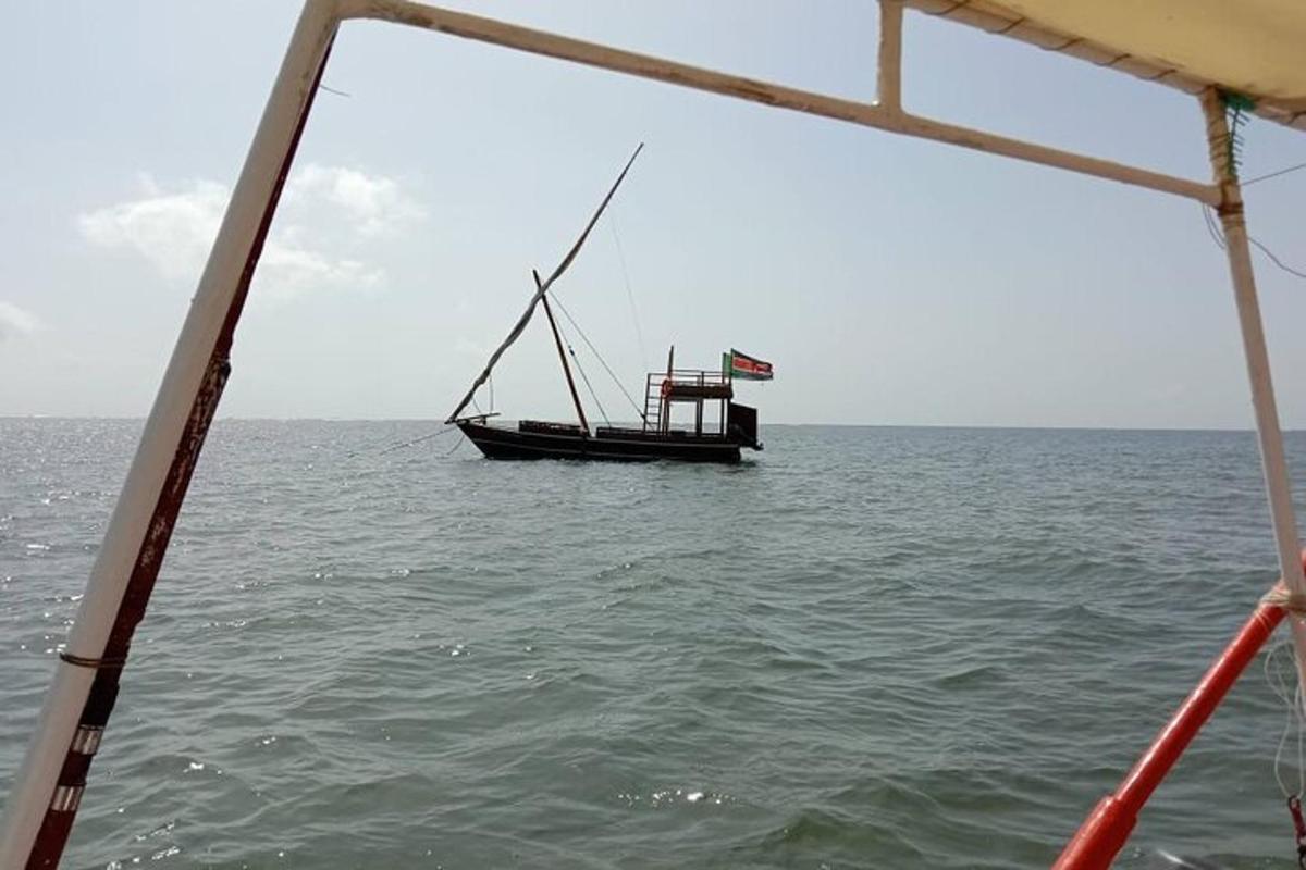a boat in the middle of the ocean