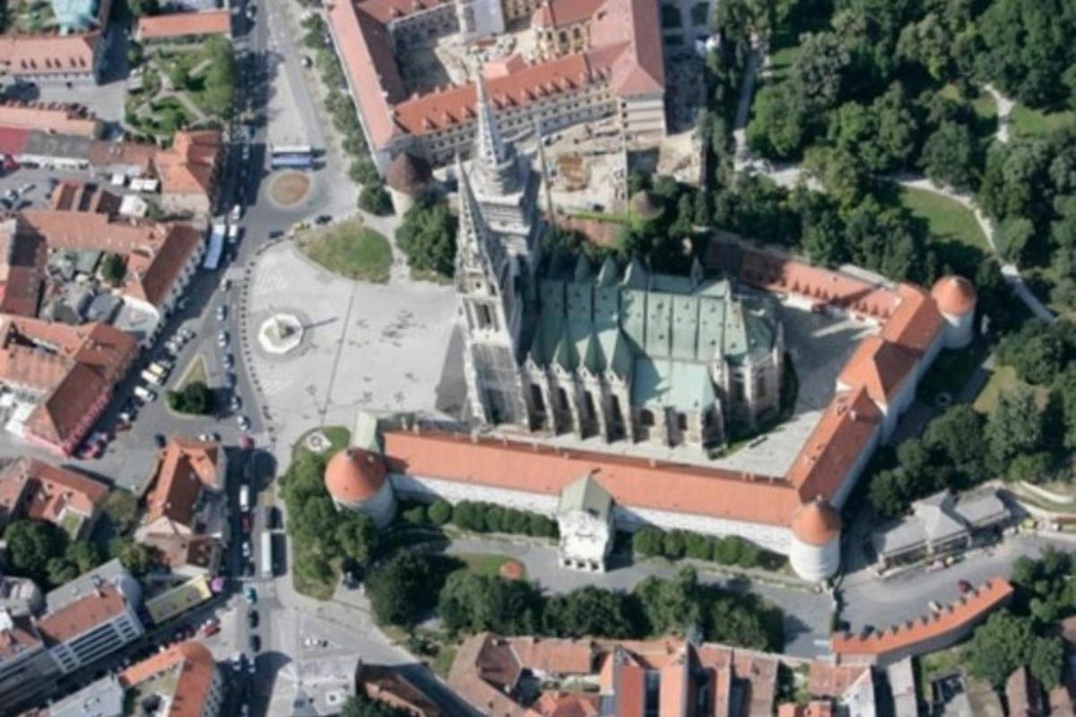 an overhead view of a large building in a city