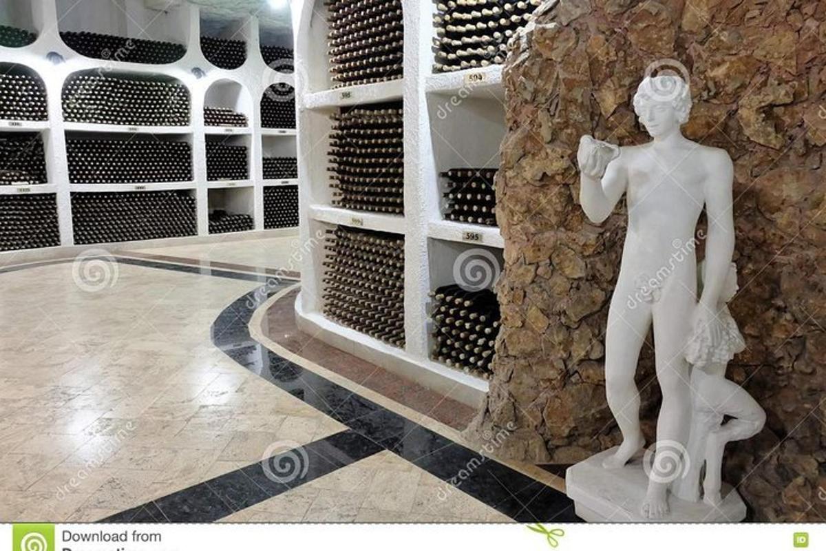 a statue of a man in a wine cellar