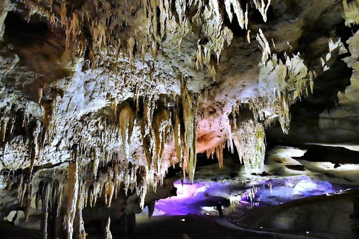 a cave with icicles hanging from the ceiling