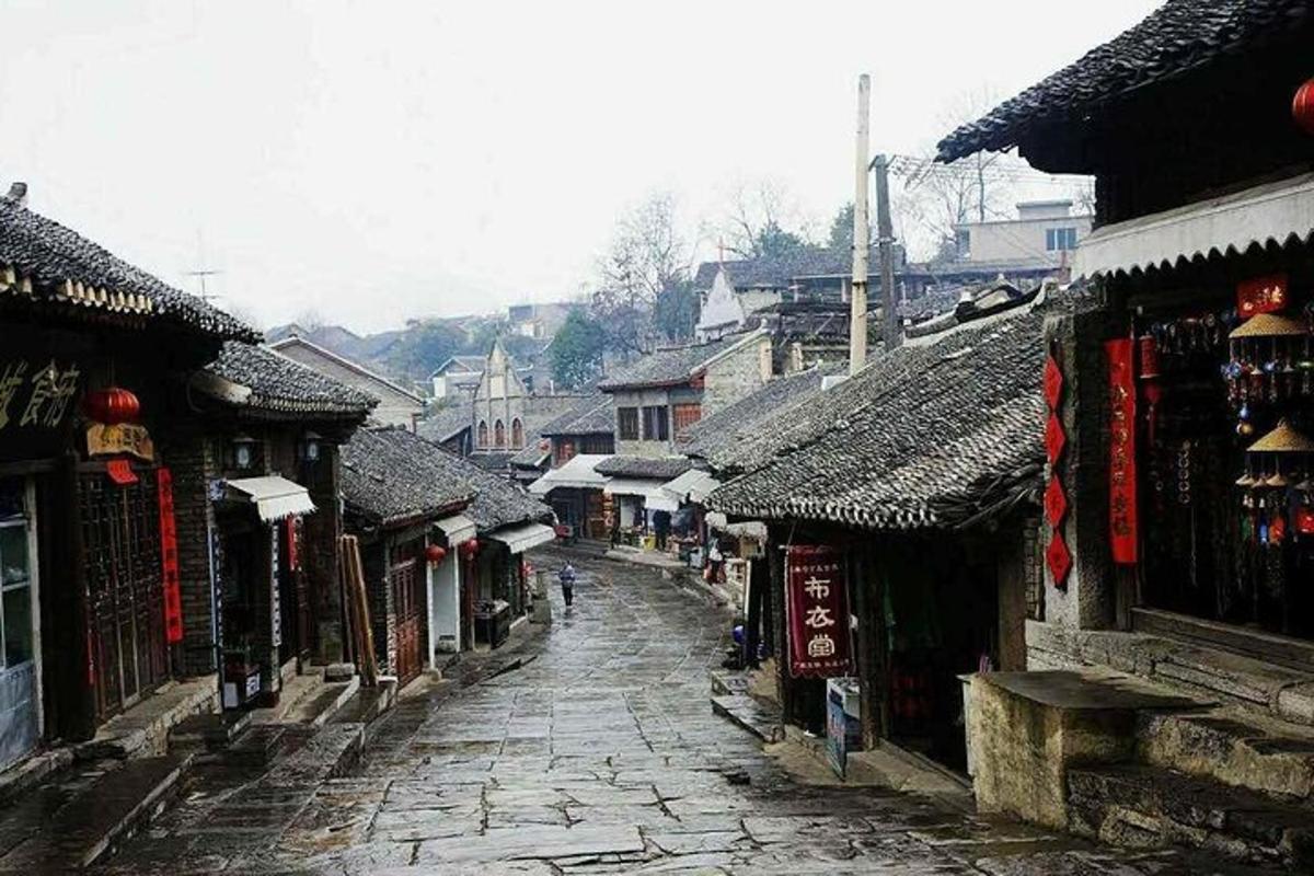 an old street in an asian village with buildings